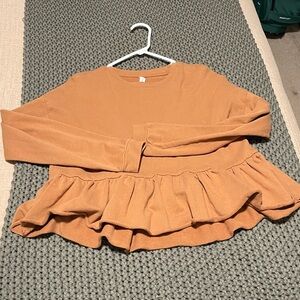 Orange Ruffle Hem Peplum top